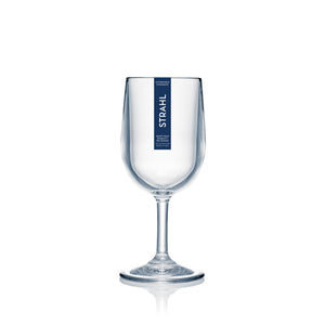 Clear wine glass with 'STRAHL' branding on a white background