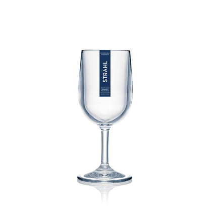 Clear wine glass with 'STRAHL' branding on a white background